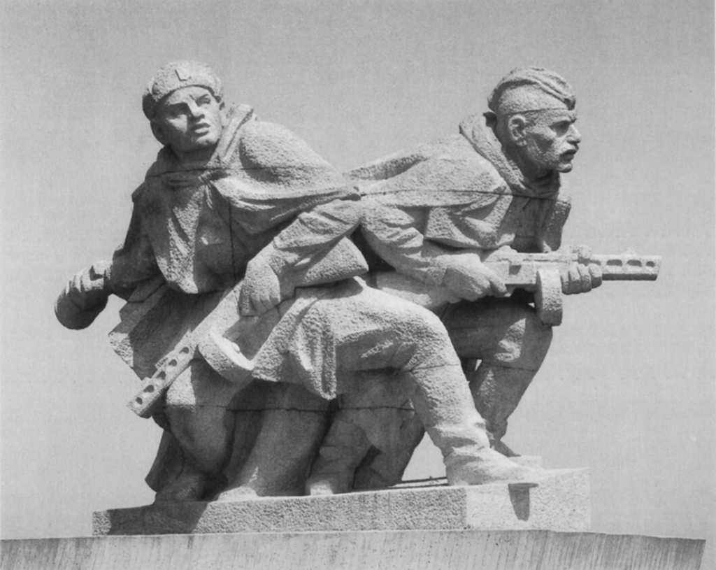 Sousoší Bratrství v boji Miloše Axmana (1926–1990) před památníkem ostravské operace v Hrabyni, dokončeným k 35. výročí osvobození v roce 1980 /foto z Miloš Axman, 1988